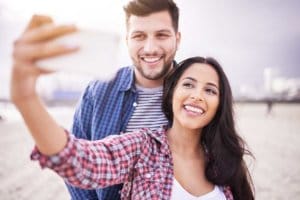 Couple on beach enjoying Tampa detox facilities